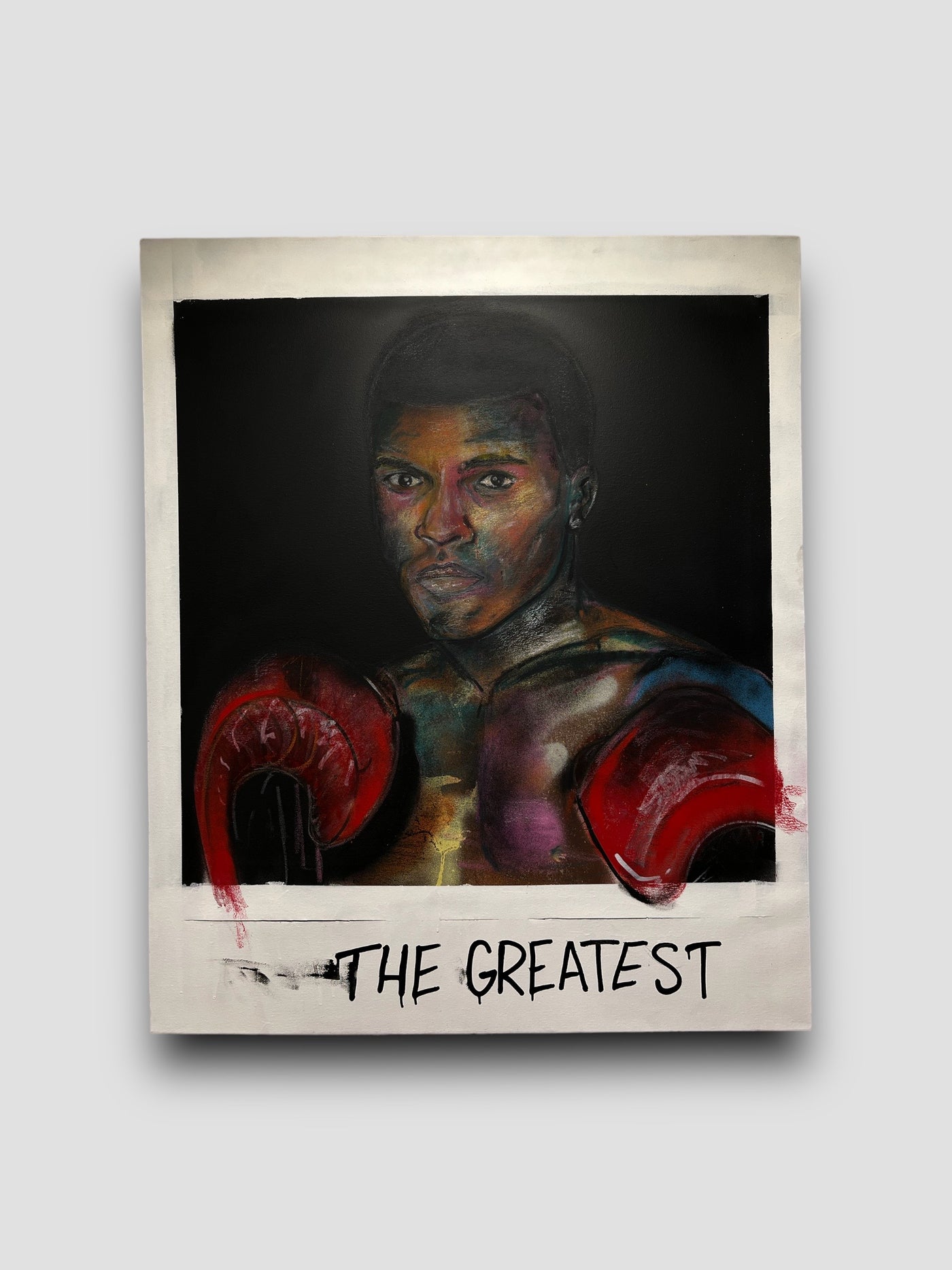 Painting of Muhammad Ali with a text that says "The Greatest"